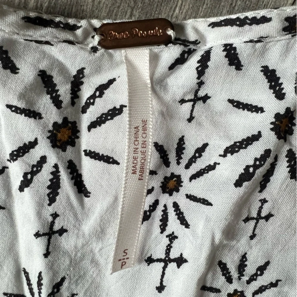 Free people Mixed print tunic. Size s